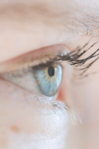 blue eye of crop woman